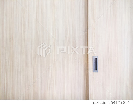 Wooden cabinet slide door with the metal handle. 54175014