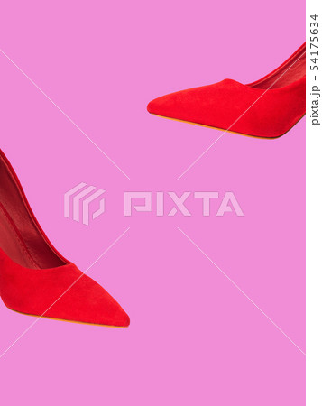 Red female pumps isolated on pink 54175634