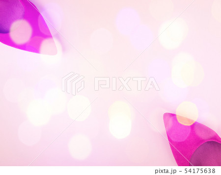 Pink background with woman's pumps and festive 54175638