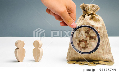 Two businessmen are standing near the bag Two businessmen are standing near the bag 54176749