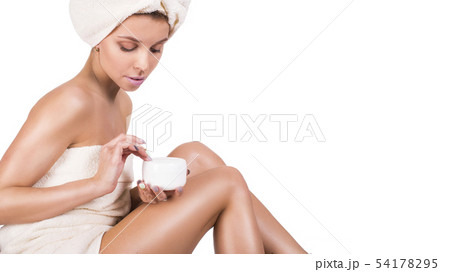 Young woman with jar of body cream isolated on white background. skin care concept Young woman with jar of body cream isolated on white background. skin care concept 54178295