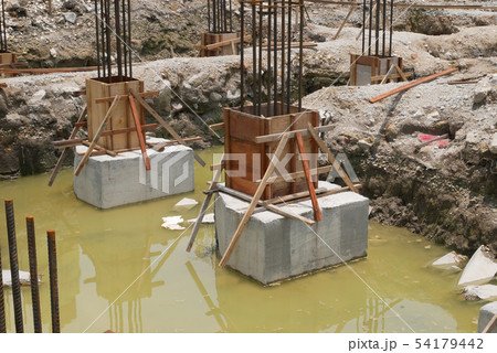 Pile cap and column stump under construction Pile cap and column stump under construction 54179442