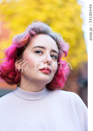 Young beautiful woman with short pink hair. Closeup portrait 54180449