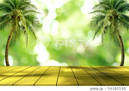 top golden metal desk with blur green leaves 54183530