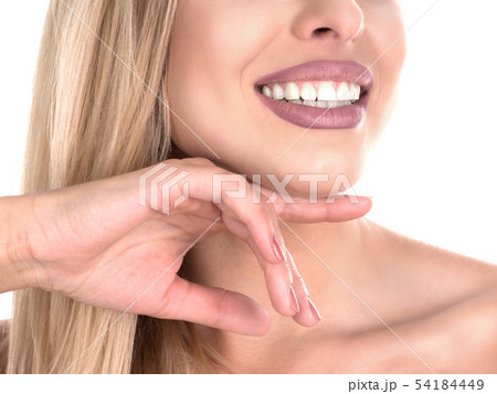 Young cute smiling girl isolated on white. showing perfect teeth. Stomatology concept Young cute smiling girl isolated on white. showing perfect teeth. Stomatology concept 54184449
