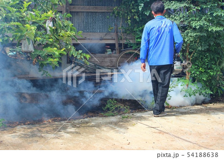 Staff are using fogging machine to spray fogging t 54188638
