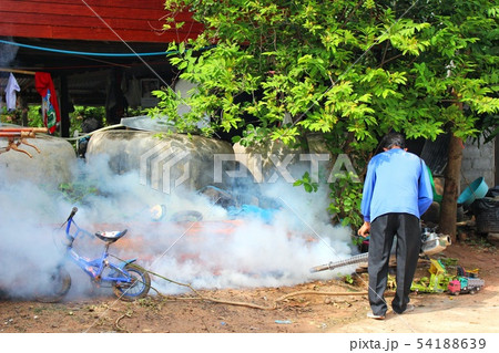 Staff are using fogging machine to spray fogging t 54188639
