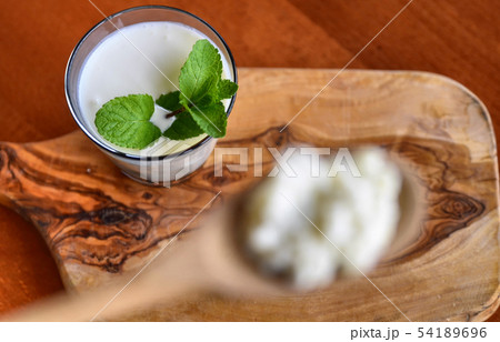 Kefir enriched with some mint leaves 54189696