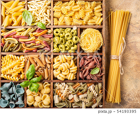 Assorted colorful italian pasta in wooden box 54193395