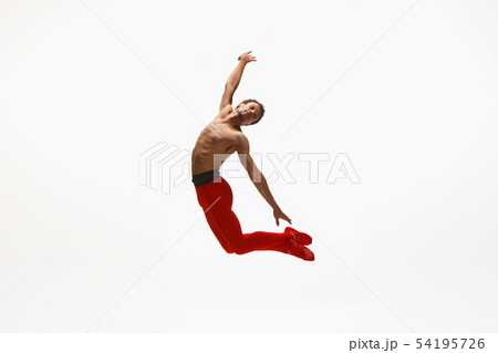 Young graceful male ballet dancer dancing on white studio background 54195726