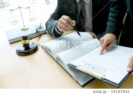 Judge or lawyer talking with team Judge or lawyer talking with team 54197642