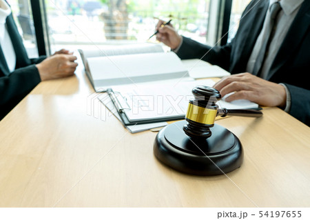 Judge or lawyer talking with team Judge or lawyer talking with team 54197655