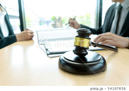 Judge or lawyer talking  with team 54197656