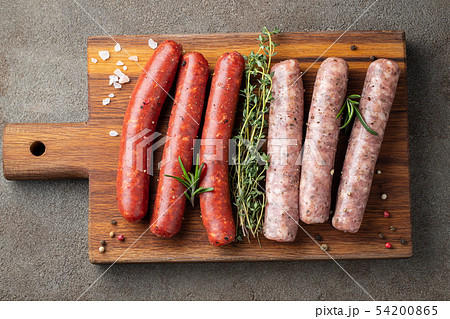 Assorted fresh raw sausages. 54200865