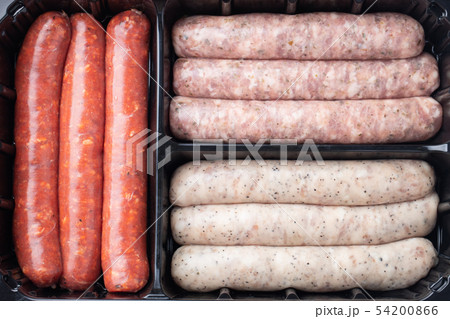 Assorted fresh raw sausages. Assorted fresh raw sausages. 54200866