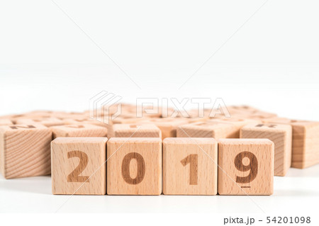 word 2019 on wood cube dices on white background. word 2019 on wood cube dices on white background. 54201098