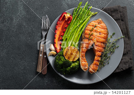 Tasty and healthy salmon steak. Tasty and healthy salmon steak. 54201127