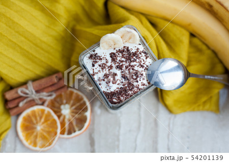 Creamy pudding with banana. Creamy pudding with banana. 54201139