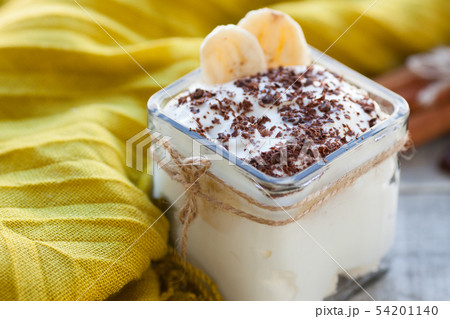 Creamy pudding with banana. Creamy pudding with banana. 54201140