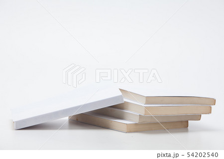Stock of books on white background 54202540