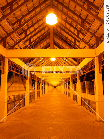 Walkway tunnel with orange yellow light with no Walkway tunnel with orange yellow light with no 54203189