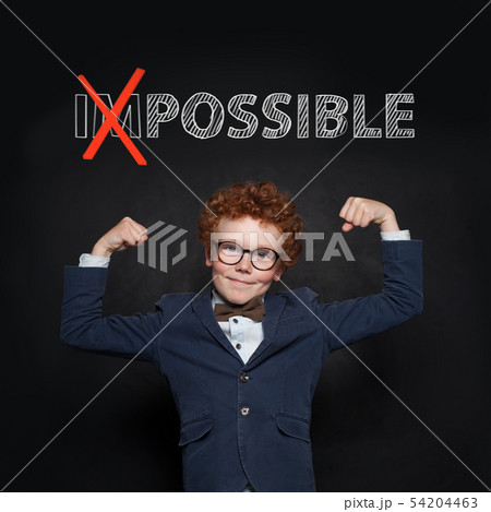 Confident strong child in suit with possible text Confident strong child in suit with possible text 54204463