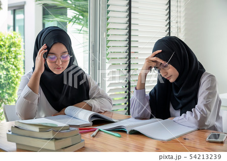 Young muslim  students in traditional clothes   54213239
