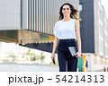 Businesswoman working with her smart phone and 54214313