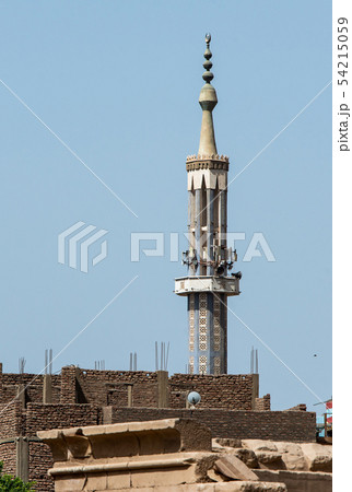 Egypt mosque with high minaret, located in the central city district in Luxor 54215059