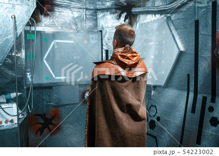 Space scientist enter data on the teleport board 54223002