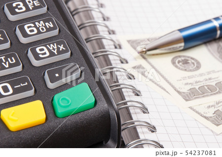 Payment terminal, notepad and money Payment terminal, notepad and money 54237081
