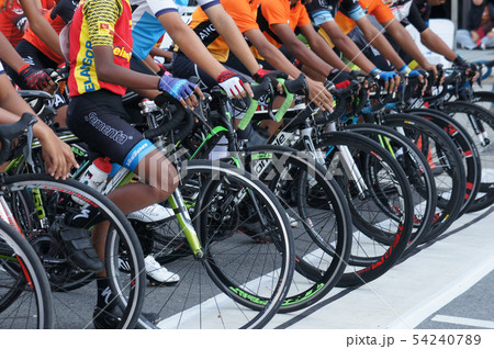 A group of boys with their racing bike. A group of boys with their racing bike. 54240789