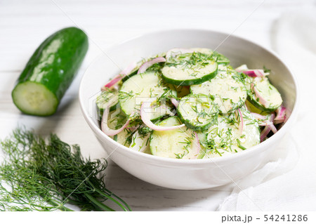 Cucumber and red onion salad 54241286