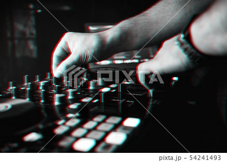 DJ mixes the track in nightclub at party hands 54241493
