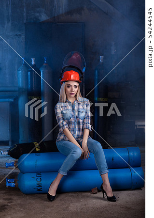 girl in a blue shirt red helmet 54244545