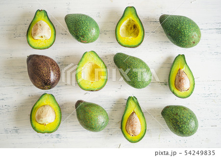Close-Up Of Avocados On White Table Close-Up Of Avocados On White Table 54249835