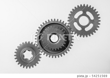 top view of 3 metal gear isolated on white 54251569