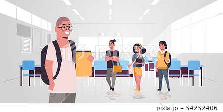 young teenage students group with backpacks holding books standing together education concept modern 54252406