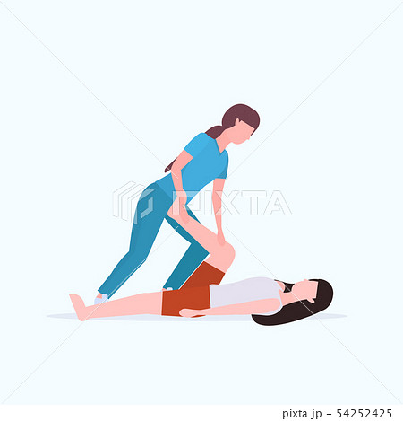 female personal trainer doing stretching exercises with girl fitness instructor helping woman to 54252425