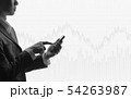 Business man using smartphone in stock market 54263987