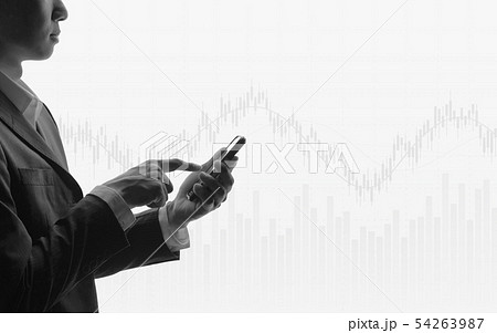 Business man using smartphone in stock market 54263987