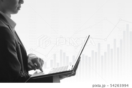Business man using laptop in stock market 54263994