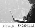 Business man using laptop in stock market 54264118