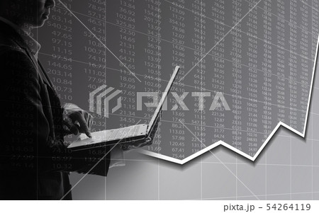 Business man using laptop in stock market Business man using laptop in stock market 54264119