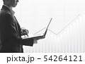 Business man using laptop in stock market 54264121