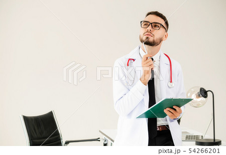 Doctor holding patients health file in hospital. 54266201