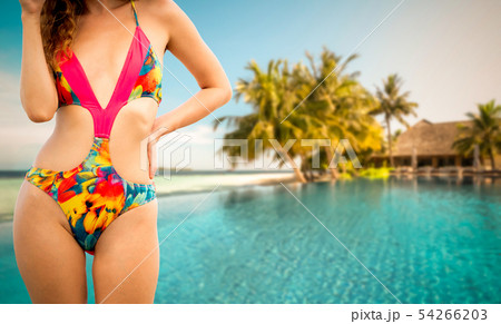 Happy young woman at beach in summer vacation. 54266203