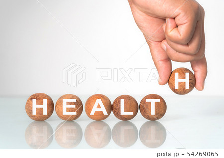 Wooden ball with word "HEALTH" concept 54269065