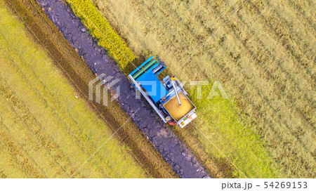 Aerial top view of Harvester machine working in Aerial top view of Harvester machine working in 54269153