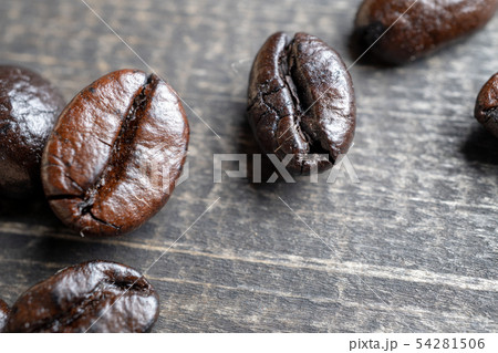 close up Coffee beans on wooden table. Copy space close up Coffee beans on wooden table. Copy space 54281506